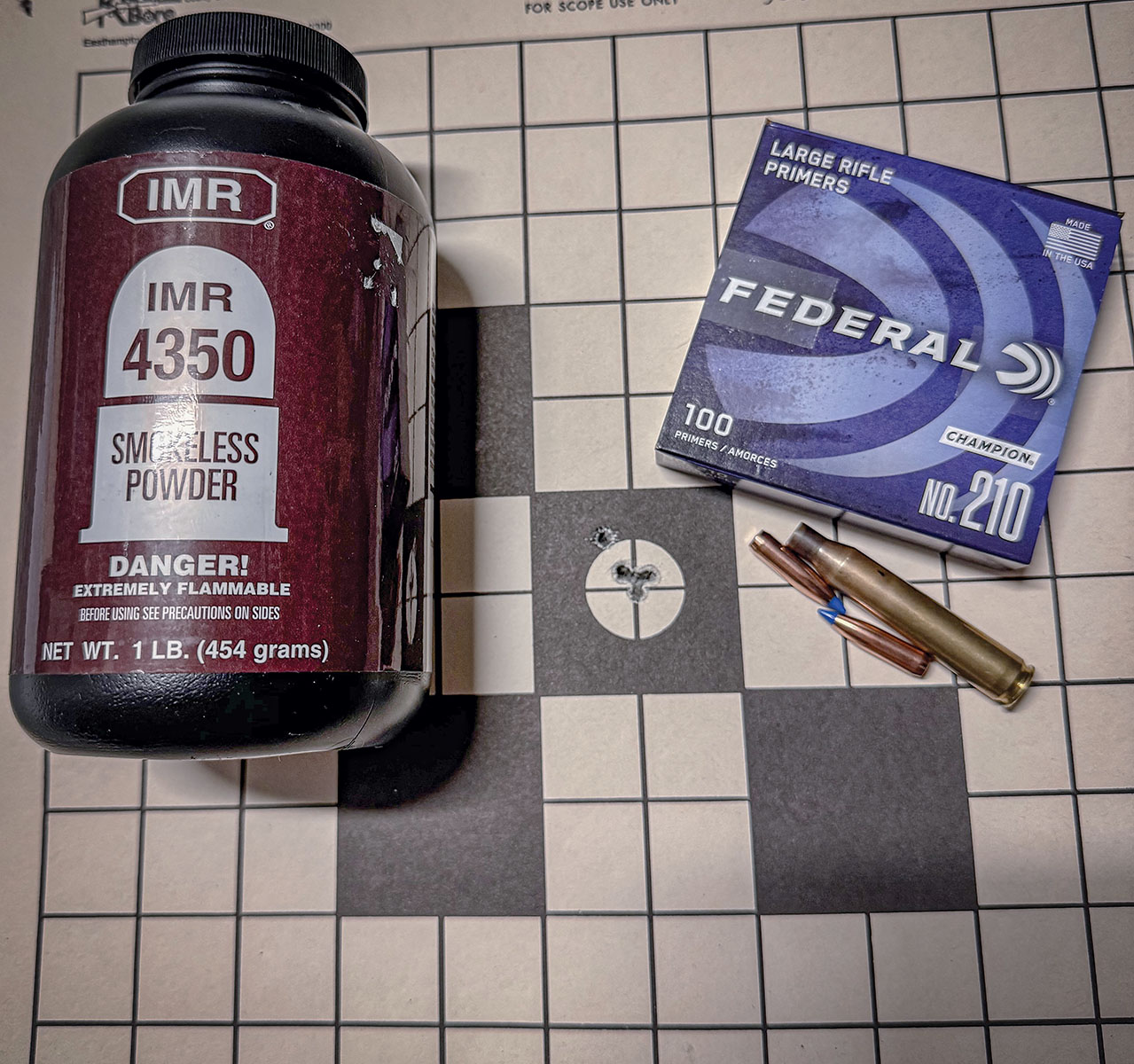 The target from testing with a 100-grain Nosler Ballistic Tip and 50.0 grains of IMR-4350. The group measured .67 inch.